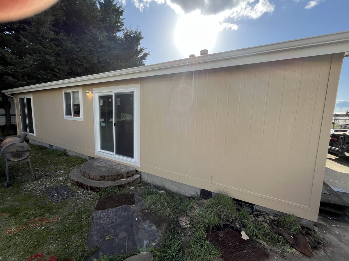 Exterior renovation with new siding and sliding door by Righteous Renovations in Salem, OR