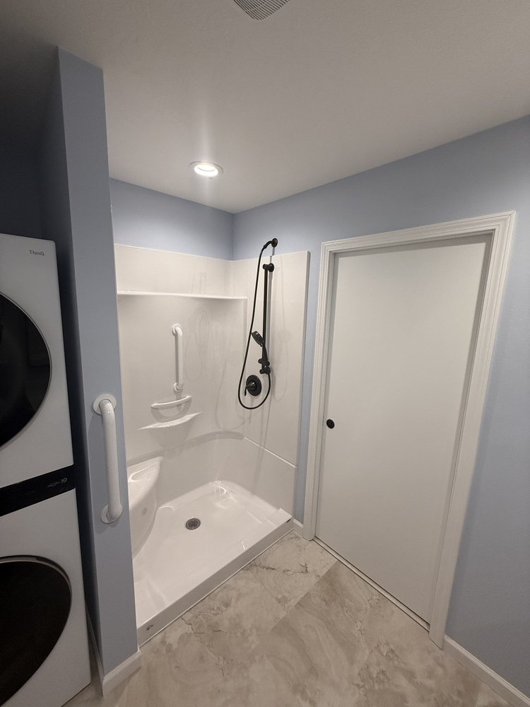 ADA-accessible bathroom shower installation in a Salem, OR custom home by Righteous Renovations
