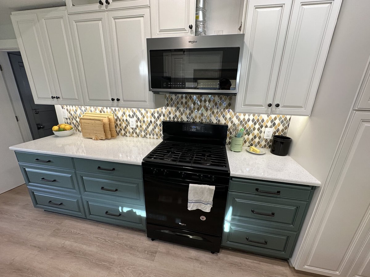 Gas range with overhead microwave and diamond mosaic backsplash in Salem, OR custom kitchen by Righteous Renovations