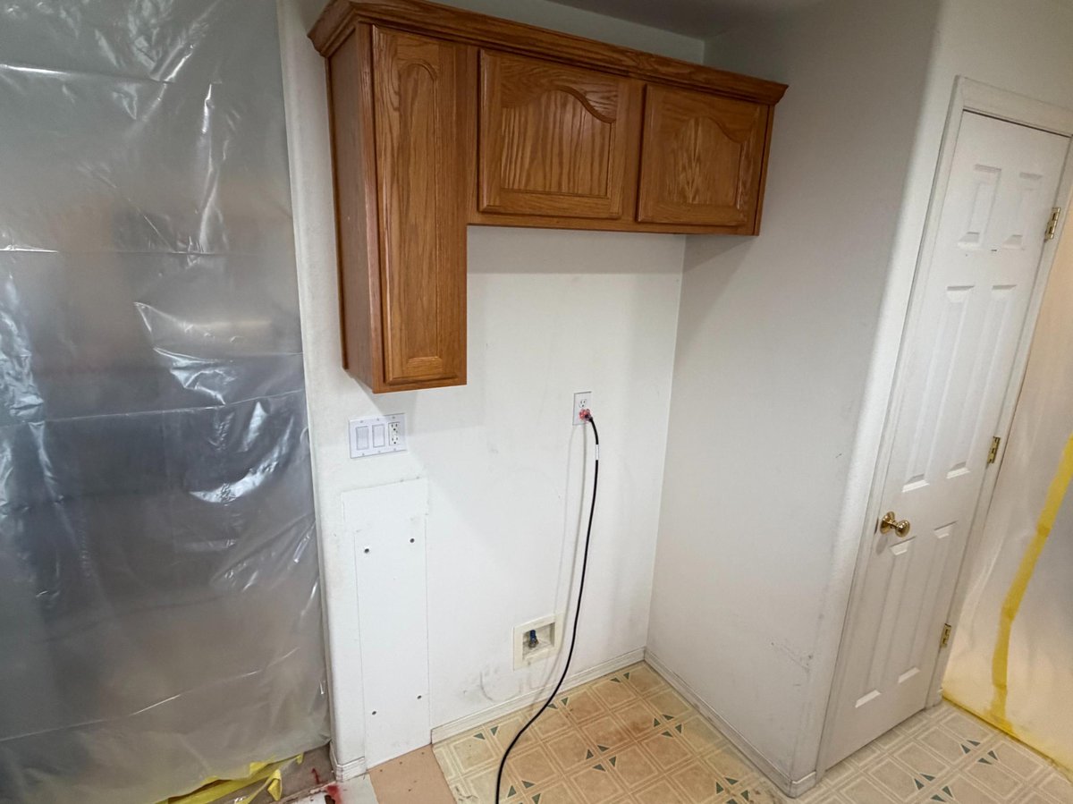 kitchen tearn down with plastic wrap protected area in salem oregon