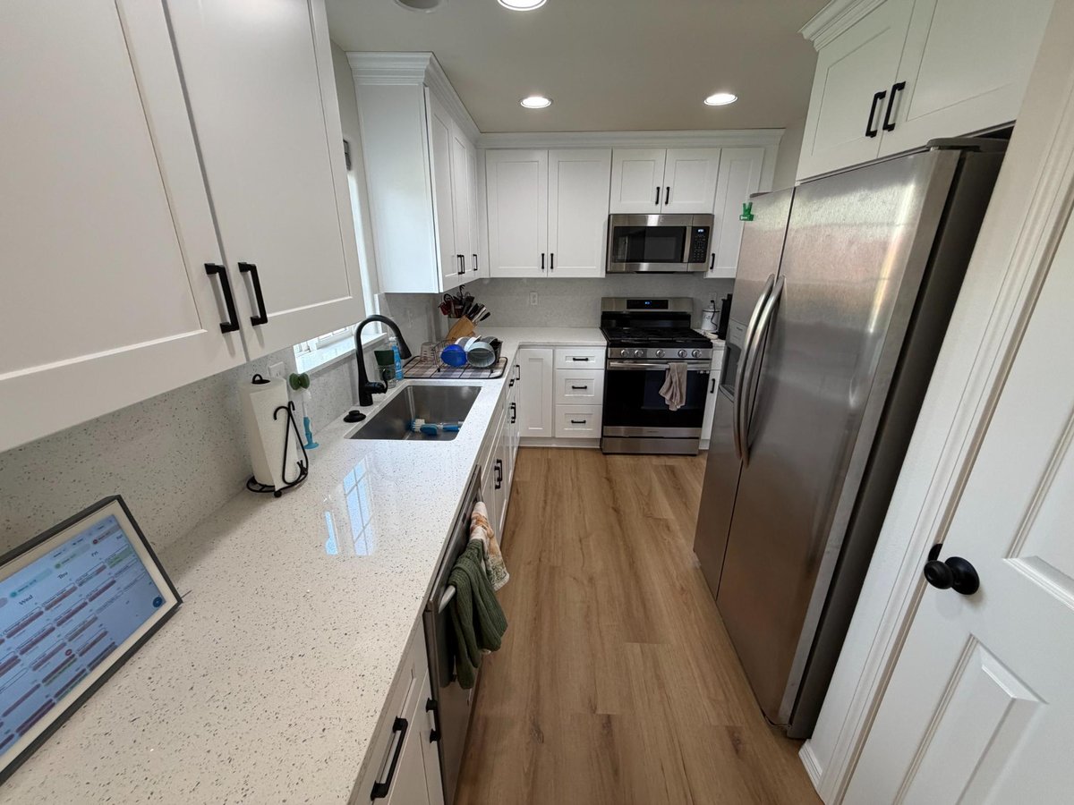 long view of updated kitchen after water damage in salem, oregon by righteous renovations