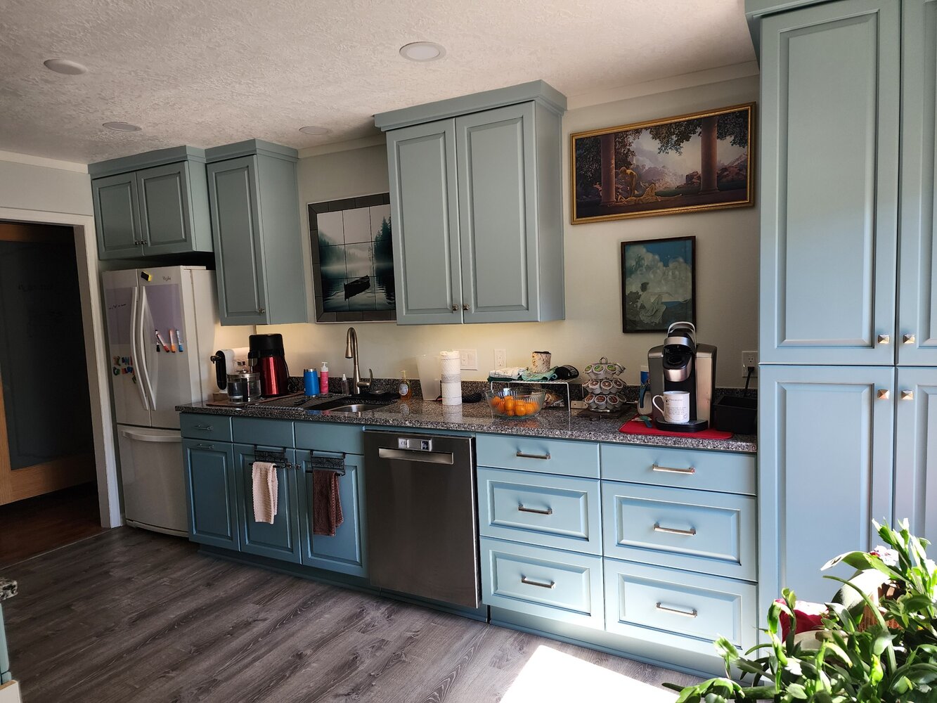 Full kitchen remodel with blue cabinetry and granite countertops by Righteous Renovations in Salem, OR